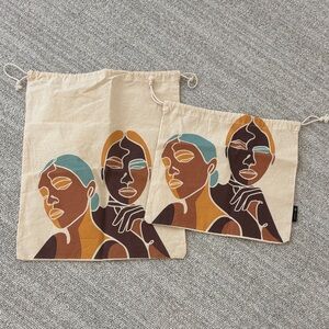 ELA x SASHA EXETER set of two cotton canvas dust bags  drawcord closure beige